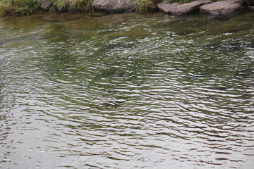 Beautiful image of flowing waves of clear water of Daecheongcheon Stream