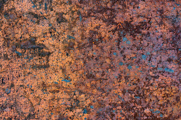 Grunge rusted metal texture, rust and oxidized metal background, closeup, top view. Old metal iron panel