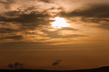 A sunset sky with clouds