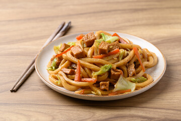 Yaki Udon, Stir fried udon noodles with tofu, carrot, cabbage and mushroom, Japanese cuisine, Asian...