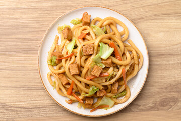 Yaki Udon, Stir fried udon noodles with tofu, carrot, cabbage and mushroom, Japanese cuisine, Asian vegetarian food