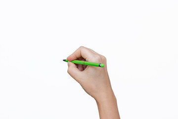 A female hand hholding a green pen simulating writing isolated on a white background. Mockup with empty copy space for text and design