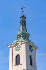 Obraz premium Clock at Bell Tower Church of Our Lady of Help in Slavonski Brod Croatia Sunny Autumn Day