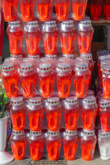 Large Stack of New Red Votive Plastic Candle Holders in Foil