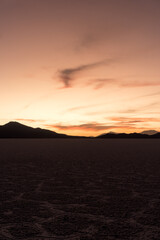 sunset in the uyuni's slalt flats desert