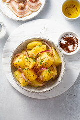 Homemade potato salad with red onion