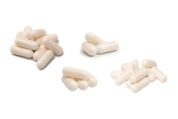 White pill capsule isolated on a white background.