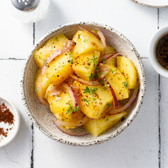 Homemade potato salad with red onion