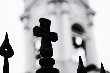 A simple yet powerful symbol on a rustic fence.