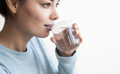 Water concept, Woman Drinking Water on white background