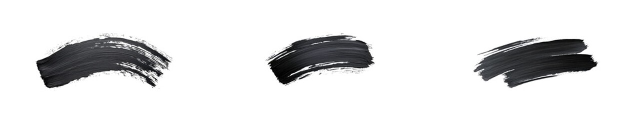 Black paint strokes created on a clean white background highlighting artistic expression and creativity during a painting session