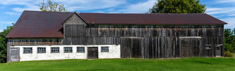 A panoramic view of an old Canadian barn © Richard Nantais