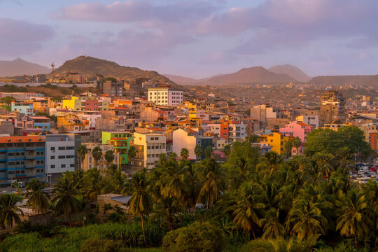 Fototapeta The neighborhoods of Praia, the capital of Cabo Verde, with the multi colored buildings and hilly landscape. 