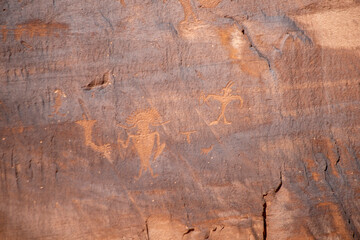 Detail of indigenous culture Petroglyphs etch in the walls along Potash Road in Moab Utah