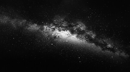 Fototapeta premium Explore the vastness of the universe with a stunning black and white depiction of a galaxy