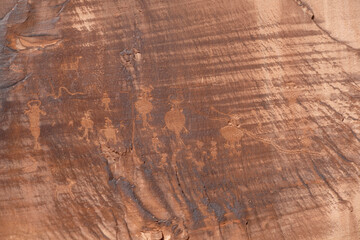 Detail of indigenous culture Petroglyphs etch in the walls along Potash Road in Moab Utah