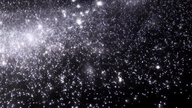 A captivating video featuring countless silver lights moving gently across a black backdrop. The effect is serene and beautiful, ideal for adding a touch of magic to any project