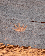 Detail of indigenous culture Petroglyphs etch in the walls along Potash Road in Moab Utah
