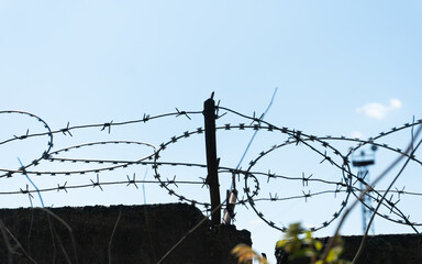 Barbed Wire Against Blue Sky