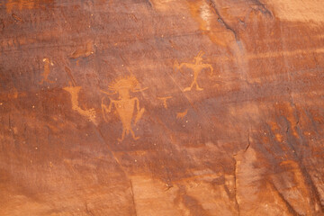 Detail of indigenous culture Petroglyphs etch in the walls along Potash Road in Moab Utah