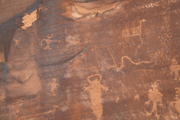 Detail of indigenous culture Petroglyphs etch in the walls along Potash Road in Moab Utah