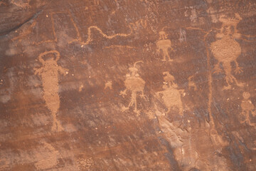Detail of indigenous culture Petroglyphs etch in the walls along Potash Road in Moab Utah