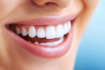 Obraz premium Dental check-up teeth cleaning smile maintenance concept. Smiling woman showcasing bright, healthy teeth.