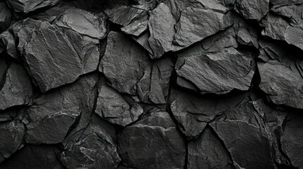 Black or dark gray rough grainy stone texture background