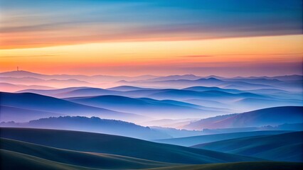 Obraz premium Serene Sunrise Over Rolling Hills and Misty Valleys