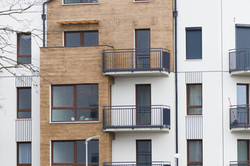 Multi-family apartment block with lots of windows