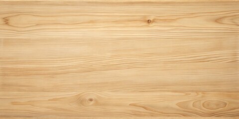 Fototapeta premium A close-up view of a light wood grain texture with subtle variations in color and natural knots