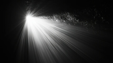 Dramatic Light Rays Streaming Through a Dark Tunnel, Illuminating Textured Walls, Creating a Mysterious Atmosphere of Hope and Discovery in Monochrome Contrast