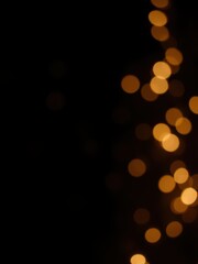 Christmas background with twinkling light spots glowing softly in the dark, creating a magical and festive atmosphere, spots