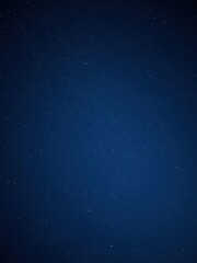 Fototapeta premium Blue dark night sky filled with twinkling stars and a sense of deep mystery, beauty, constellation