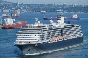 Modern cruiseship cruise ship ocean liner Noordam sail away departure from port of Vancouver,...