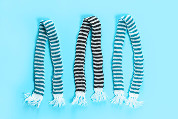 Set of striped scarves made of wool. Protecting the neck and throat from cold weather.