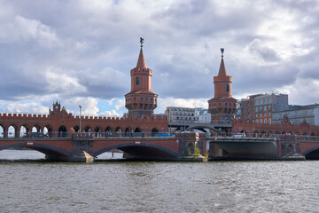 Obraz premium Oberbaum Bridge Berlin Germany. The historic Oberbaum Bridge crossing the Spree river, Berlin, Germany. 
