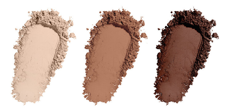 Set swatch texture of brown and beige loose powder for face makeup on an isolated white background. For light, medium and dark skinned women. Eye shadow or sculptor or bronzer