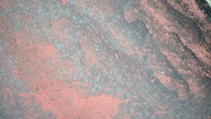 Rust on the iron for the background. old peeling paint on rusty gates.