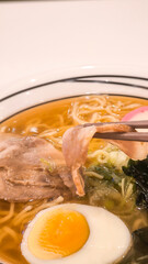 Ramen is a Japanese style food. A dish with a variety of ingredients.