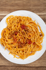 top view spaghetti with classic bolognese sauce at vertical composition
