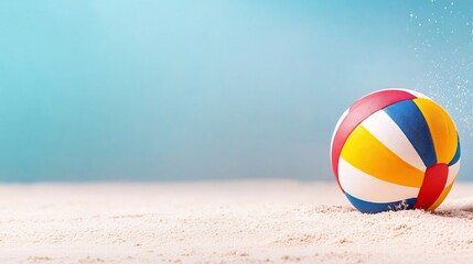 Obraz premium Colorful Volleyball Ball on Sandy Beach Court Ready for Summer Recreation