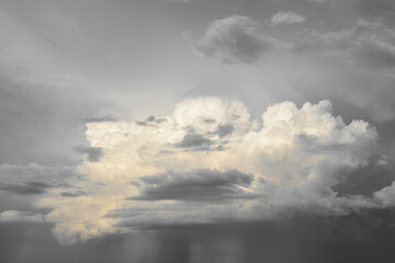 a stormy cloud in the sky isolated monochrome black and white