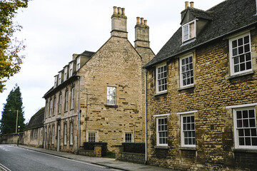 Beautiful English Street in Stamford with Lincolnshire Limestone Houses and Buildings in the Autumn, quintessential town and city in England