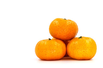 Close up of fresh orange fruit on gray background, selective focus and blank space concept.