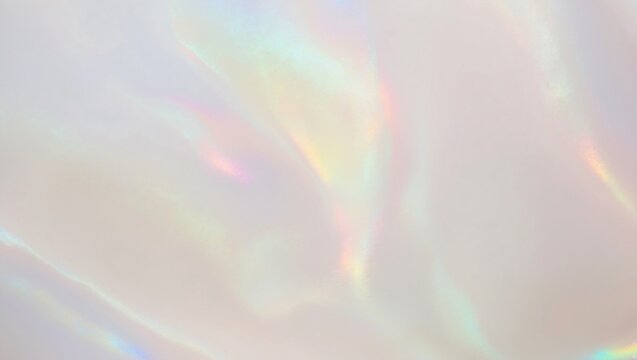 Soft White Opalescent Texture with Subtle Hues in a Full-Frame Capture, Ideal for Backgrounds and Design Projects Evoking Elegance and Serenity