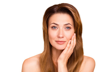 Fototapeta premium Close up photo beautiful amazing mature cute she her lady hold hands arms cheek cheekbone show touch got much younger facial skin result anti-age mask procedures nude isolated pastel beige background