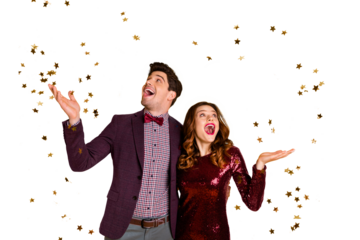 Portrait of impressed millennial raise hands meeting see confetti scream  shout dress suit tux tuxedo wavy curly hairdo isolated over yellow background