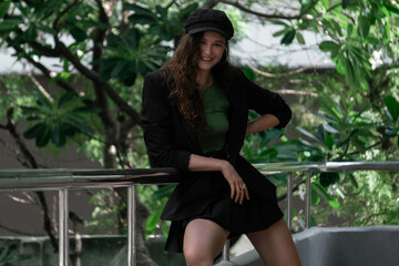 Beautiful girl dancing modern choreography on the street