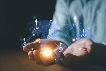 Businessman control global online marketplace and reach for customer engagement with insight data...